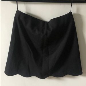 Black mini TopShop scalloped skirt.